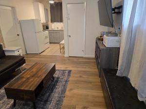 a living room with a couch and a coffee table at Modern Victorian by Beach and Forest Unit D in Crescent City +6 photos