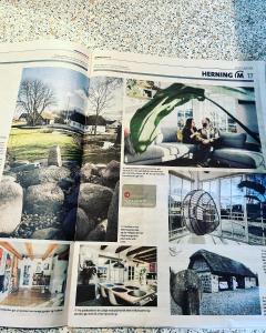 a page of a magazine with pictures of houses at Stråtækt Idyl in Nørre Kollund