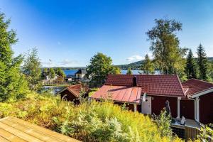 an aerial view of a house with a red roof at VAR986-Rada-As-34 in Råda