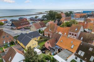 an overhead view of a town with houses and the ocean at AE315-Marstal-Kongensgade-8 in Marstal
