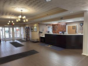 a large lobby with a reception desk in a building at Comfort Suites Scranton near Montage Mountain in Scranton +88 photos