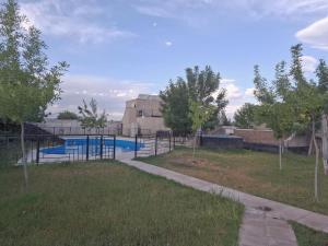 a view of a swimming pool at a building at Oasis Pueyrredón in Rodeo del Medio