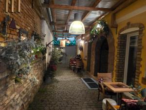 an alley with a table and chairs in a building at Altstadt Speyer in Speyer