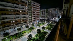 an aerial view of an apartment complex at night at CL Home Lux in Podgorica +11 photos