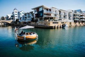 a group of people in a boat in the water at Wannanup Retreat - Sleeps 2 - Pet Friendly in Wannanup