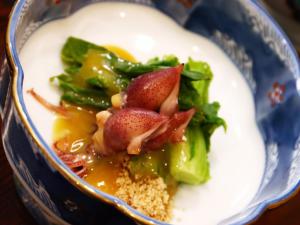 a plate of food with broccoli and strawberries on it at Yunohirakan in Takayama