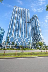 a large building with two tall skyscrapers at Thuý Doji Diamond Apartment in Hai Phong