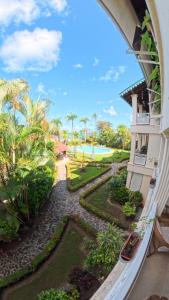 a view from the balcony of a resort at La Dolce Vita Beachfront Apt 9 in Las Terrenas