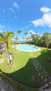 an image of a swimming pool at a resort at La Dolce Vita Beachfront Apt 9 in Las Terrenas