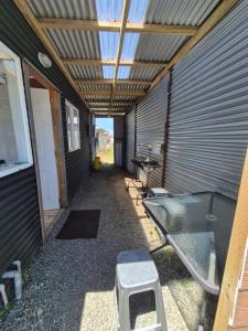 an empty hallway of a house with a ceiling at Cabaña ByB in Dalcahue +1 photo