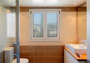 Bilik mandi di Helion Apartments - Parallel