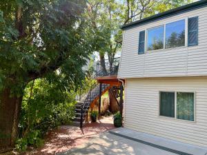 a house with a staircase leading up to a house at Aunt Beans Guest Suite in Kanab