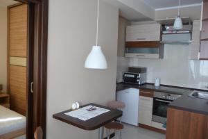 مطبخ أو مطبخ صغير في Apartament Bella Nova Centrum