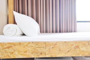 Krevet ili kreveti u jedinici u objektu With Inn Hostel