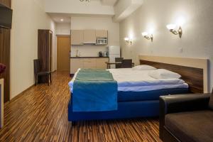 Postel nebo postele na pokoji v ubytování Pirita Beach Apartments & SPA
