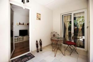 TV a/nebo společenská místnost v ubytování Apartment Roko