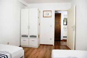 Postel nebo postele na pokoji v ubytování Apartment Roko