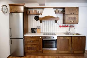 Kuchyň nebo kuchyňský kout v ubytování Apartment Roko