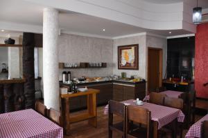 Kuchyň nebo kuchyňský kout v ubytování Hotel Holiday Foz