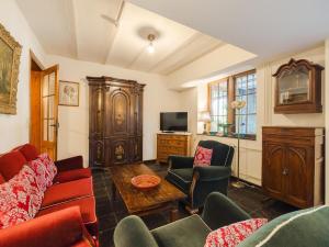 a living room with a couch and chairs at Beautiful castle in Spa wit garden in Spa