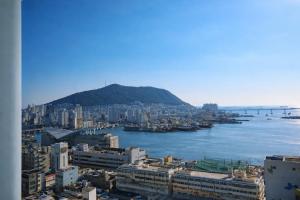 a view of a city and a body of water at Nampo Stay 99 in Busan