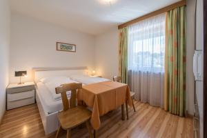 Postel nebo postele na pokoji v ubytování Garni-Residence Villa Paul