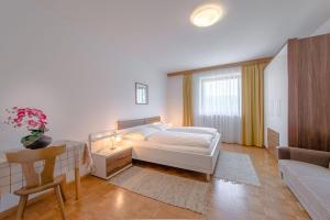 Postel nebo postele na pokoji v ubytování Garni-Residence Villa Paul