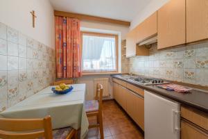 Kuchyň nebo kuchyňský kout v ubytování Garni-Residence Villa Paul