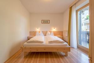 Postel nebo postele na pokoji v ubytování Garni-Residence Villa Paul