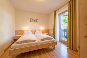 Postel nebo postele na pokoji v ubytování Garni-Residence Villa Paul