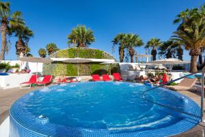 Бассейн в Tigotan Lovers & Friends Playa de las Americas - Adults Only (+18) или поблизости
