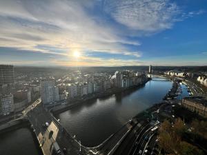 a view of a river in a city at Casa Cielo-Spectacular View-Center-Chic-Spacious in Liège