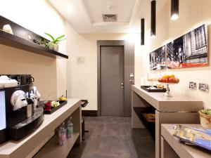 Kuchyňa alebo kuchynka v ubytovaní Quirinale Luxury Rooms