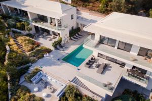 an aerial view of a house with a swimming pool at Luxury Villas Skiathos in Skiathos