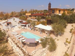 an overhead view of a resort with a swimming pool at B&B Eyexei Domus in Agrigento