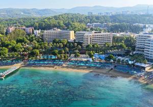 an aerial view of a beach with a resort at Özkaymak Select Resort Hotel - Ultra All Inclusive in Alanya