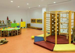 a room with a play room with a play room at Özkaymak Select Resort Hotel - Ultra All Inclusive in Alanya