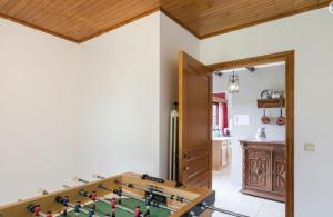 a room with a table with a chess board on it at L'Echappée Belle in Beauraing