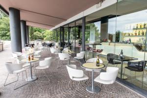 Reštaurácia alebo iné gastronomické zariadenie v ubytovaní Sotel Nomentana Roma