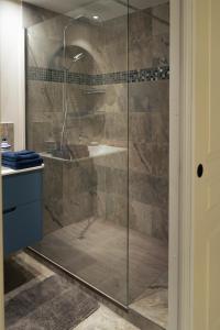 a shower with a glass door in a bathroom at ZEN MARINA in Mandelieu-La Napoule +15 photos