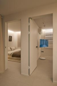 a room with a door leading to a bedroom at Stay Seongsu Villa in Seoul
