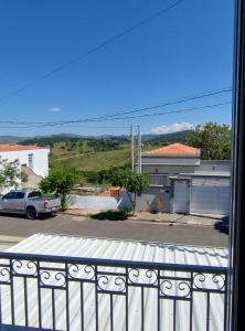 a view of a parking lot from a balcony at Casa aconchego in Socorro
