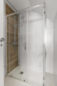 a shower with a glass door in a bathroom at Fuengirola I in Fuengirola +22 photos