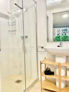 a bathroom with a shower and a sink at Loft Manuel Arellano in Seville