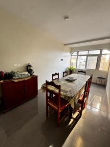 a dining room with a table and chairs at Cozy Home with Terrace Views! in Ponta do Sol