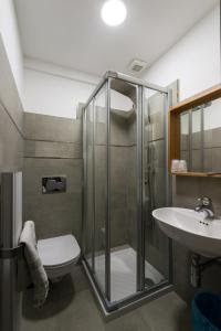 Et badeværelse på Hotel Rinaldo Apartment
