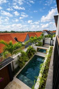 an image of a swimming pool on the roof of a house at 2BR Villa Surrounded by Rice Fields Cemagi in Cemagi