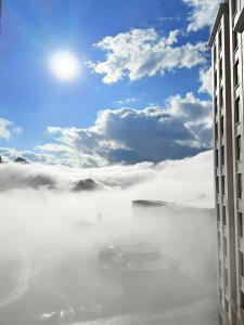 a view of a blanket of fog in the middle of a building at Rose Home in Lao Cai