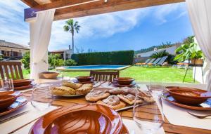 a table with plates of food on top of it at Ca Na Rosa De Selva in El Port de la Selva +40 photos