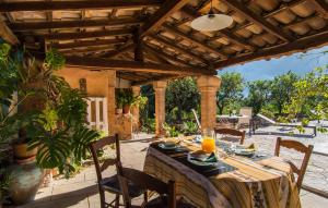 an outdoor dining room with a table and chairs at Frontera in Sóller +41 photos